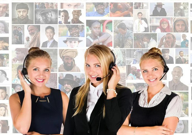 Contact centre agents wearing headsets